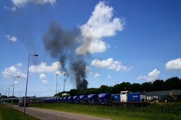 Brandend afval Amsterdam te zien in de wijde omtrek