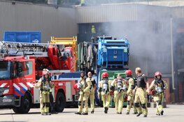 Brandend afval Amsterdam te zien in de wijde omtrek