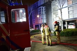 Auto in carport in brand