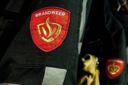 Brandweer redt drie mensen uit brandende woning Amsterdam