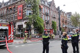 Brand in winkel, woningen ontruimd