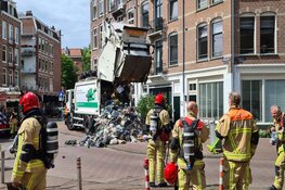 Afval op straat gegooid bij brandje in vuilniswagen op de Brederodestraat