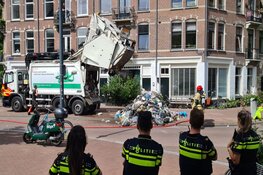 Afval op straat gegooid bij brandje in vuilniswagen op de Brederodestraat