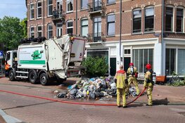 Afval op straat gegooid bij brandje in vuilniswagen op de Brederodestraat