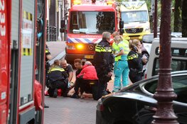 Vrouw uit water Herengracht gehaald