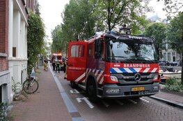 Vrouw uit water Herengracht gehaald