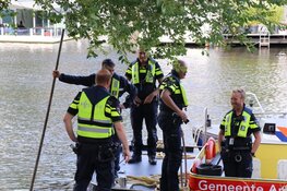 Vrouw uit water Herengracht gehaald