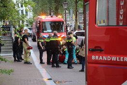 Vrouw uit water Herengracht gehaald