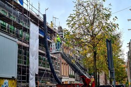 Muur valt op bouwvakker in de Pijp