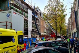 Muur valt op bouwvakker in de Pijp