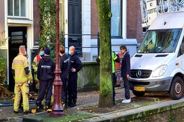 Gewonde bij korte felle brand in woning Oudezijds Achterburgwal