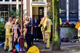 Gewonde bij korte felle brand in woning Oudezijds Achterburgwal