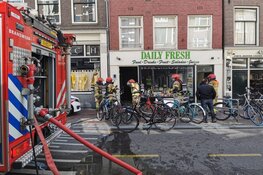 Brand in winkel Haarlemmerstraat