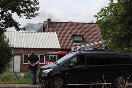 Woning onbewoonbaar na brand in dak in Amsterdam