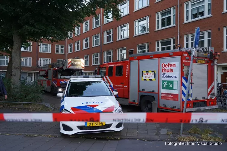 Woningbrand en overval op Surinameplein