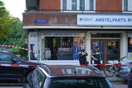 Woningbrand en overval op Surinameplein