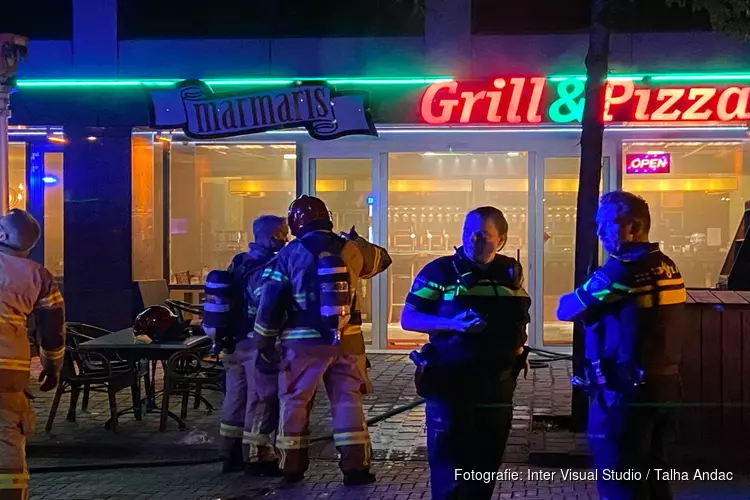 Brand in pizzeria, hotel ontruimd in Sloterdijk