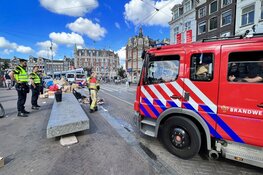 Tramverkeer Muntplein tijdelijk stilgelegd vanwege containerbrand
