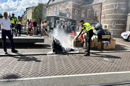 Tramverkeer Muntplein tijdelijk stilgelegd vanwege containerbrand