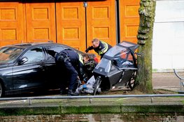 Spandoek met beledigende teksten weggehaald voor woning burgemeester