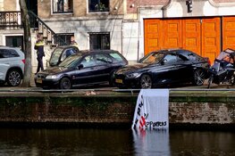 Spandoek met beledigende teksten weggehaald voor woning burgemeester