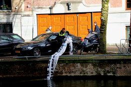 Spandoek met beledigende teksten weggehaald voor woning burgemeester