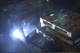 Boot in brand langs Leidsekade