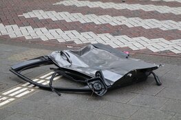 Motoragent in botsing met auto in Amsterdam-Zuid