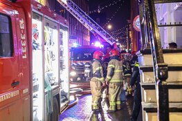 Brand in een woning aan de Wolvenstraat in Amsterdam-Centrum