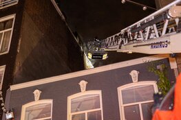 Brand in een woning aan de Wolvenstraat in Amsterdam-Centrum