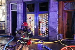 Brand in een woning aan de Wolvenstraat in Amsterdam-Centrum