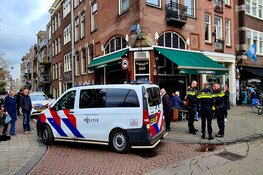Zakkenroller achtervolgt en gepakt op straat door standwerker