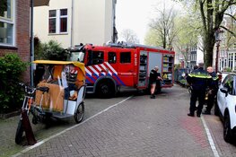 Fietstaxi`s in brand in Amsterdam-Centrum