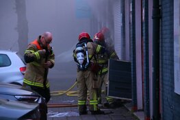 Brand bij garagebedrijf in Amsterdam
