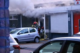 Brand bij garagebedrijf in Amsterdam