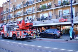 Brand in woning Mercatorplein, bewoners vluchten dakterras op