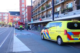 Brand in woning Mercatorplein, bewoners vluchten dakterras op