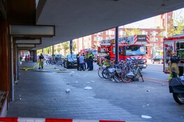 Brand in woning Mercatorplein, bewoners vluchten dakterras op