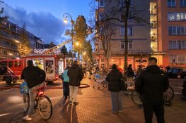 Uitslaande brand op balkon in Dapperstraat