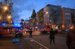 Uitslaande brand op balkon in Dapperstraat