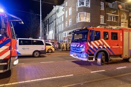 Brand in grachtenpand in Amsterdam