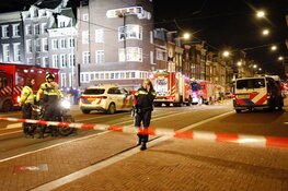 Brand in grachtenpand in Amsterdam