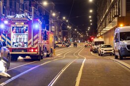 Brand in grachtenpand in Amsterdam