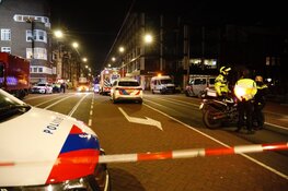 Brand in grachtenpand in Amsterdam
