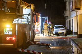 Woning uitgebrand aan de Comeniusstraat, mensen met ladderwagen gered