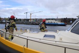 Brand op schip in Oude Houthaven
