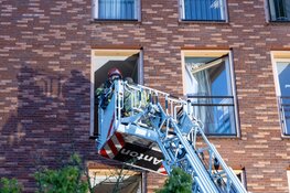 Brand in flat in Amsterdam-Zuidoost, trappenhuis vol rook