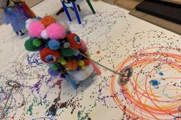 Tekenrobots en Memory-milieuspel op expositie van het Orion College