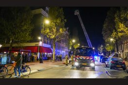 Muur van Amsterdamse kroeg gesloopt om brand te blussen