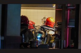 Muur van Amsterdamse kroeg gesloopt om brand te blussen